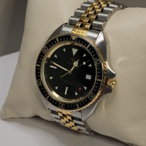 Vintage mens Zodiac Red Point 1980s dive watch monnin case.
